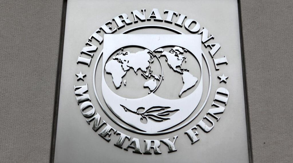 The International Monetary Fund (IMF) logo is seen at the IMF headquarters building in Washington, in this April 18, 2013 file photo. The IMF is expected to issue its semi-annual world economic outlook this week. REUTERS/Yuri Gripas/Files GLOBAL BUSINESS WEEK AHEAD PACKAGE - SEARCH "BUSINESS WEEK AHEAD JANUARY 18" FOR ALL IMAGES